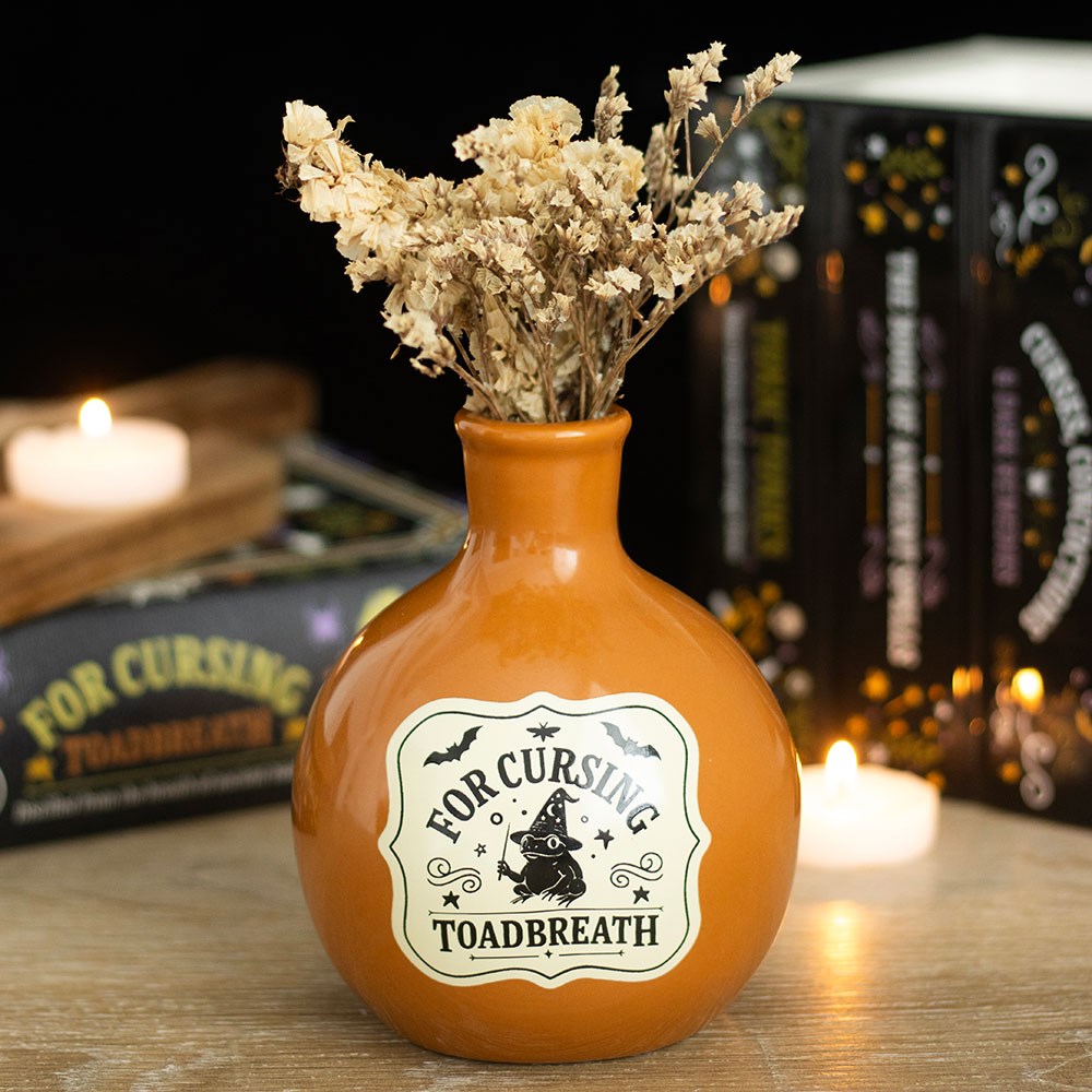 Vase und Kerzenhalter in Form einer Flasche mit dem Zaubertrank „Toadbreath“