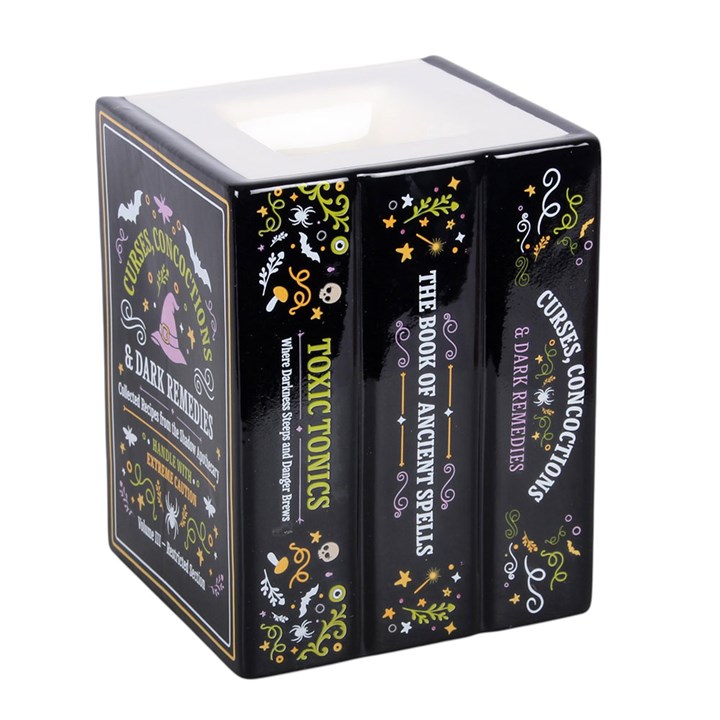 Ölbrenner und Wachserhitzer in Form eines Hexenapothekenbuchs