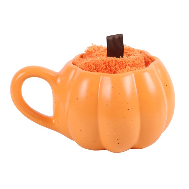 Set aus einer Tasse in Kürbisform und Socken