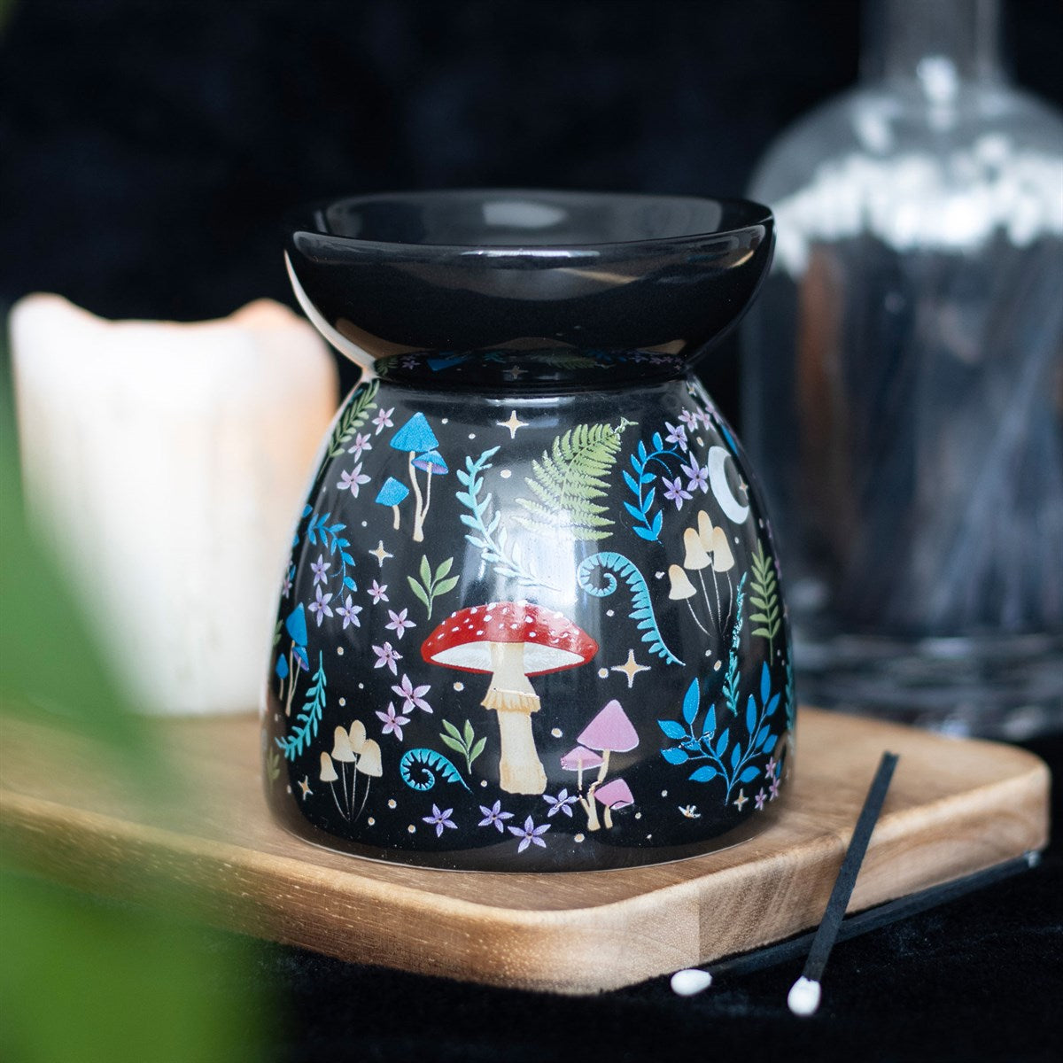Ölbrenner mit „Dark Forest“-Motiv