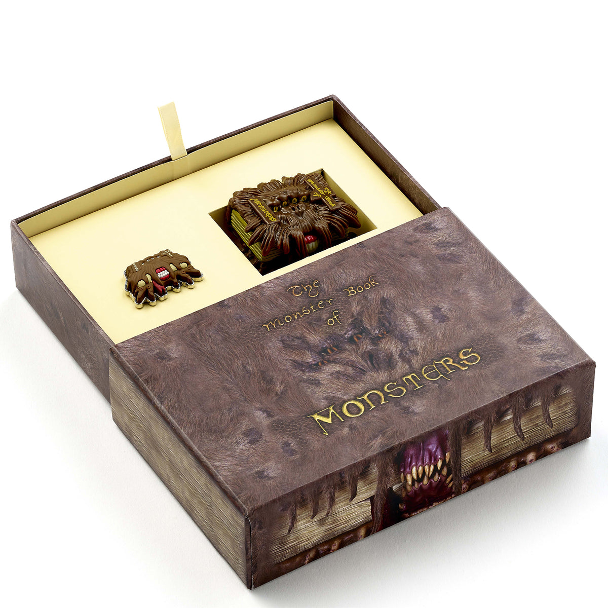 Harry-Potter-Monsterbuch-Geschenkbox mit Monsterbuch-Schlüsselanhänger und Anstecknadel